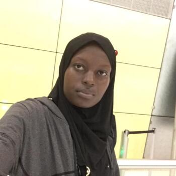 مربية أطفال في العين: Nalubega