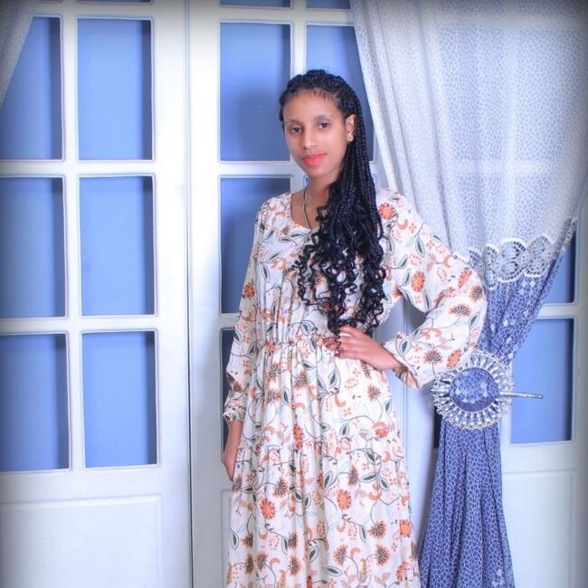 مربية أطفال في الريان: Tsedey