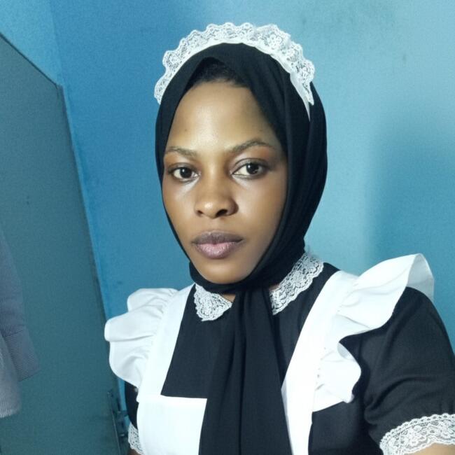 مربية أطفال في إمارة الشارقة: Babirye