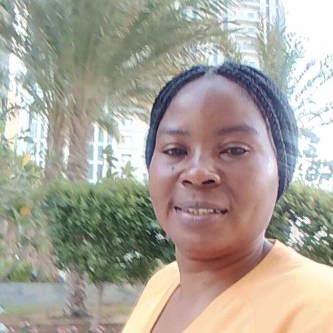 مربية أطفال في إمارة الشارقة: Christine