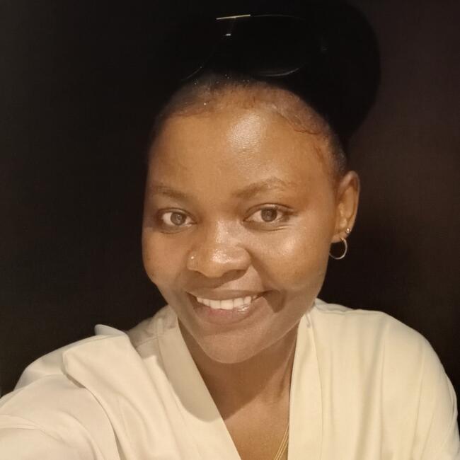 مربية أطفال في الدوحة: Margaret